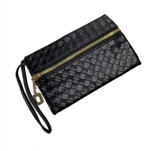 Black Faux Leather Woven Gold Tone Exposed Zipper Wristlet